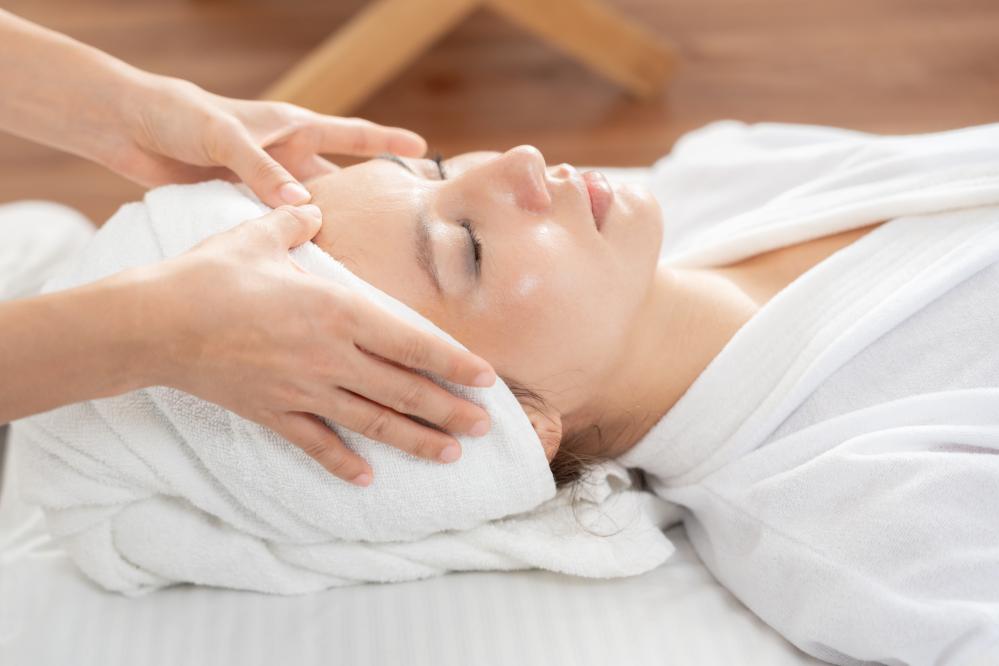 Woman experiencing the benefits of therapeutic massage in Lakeville