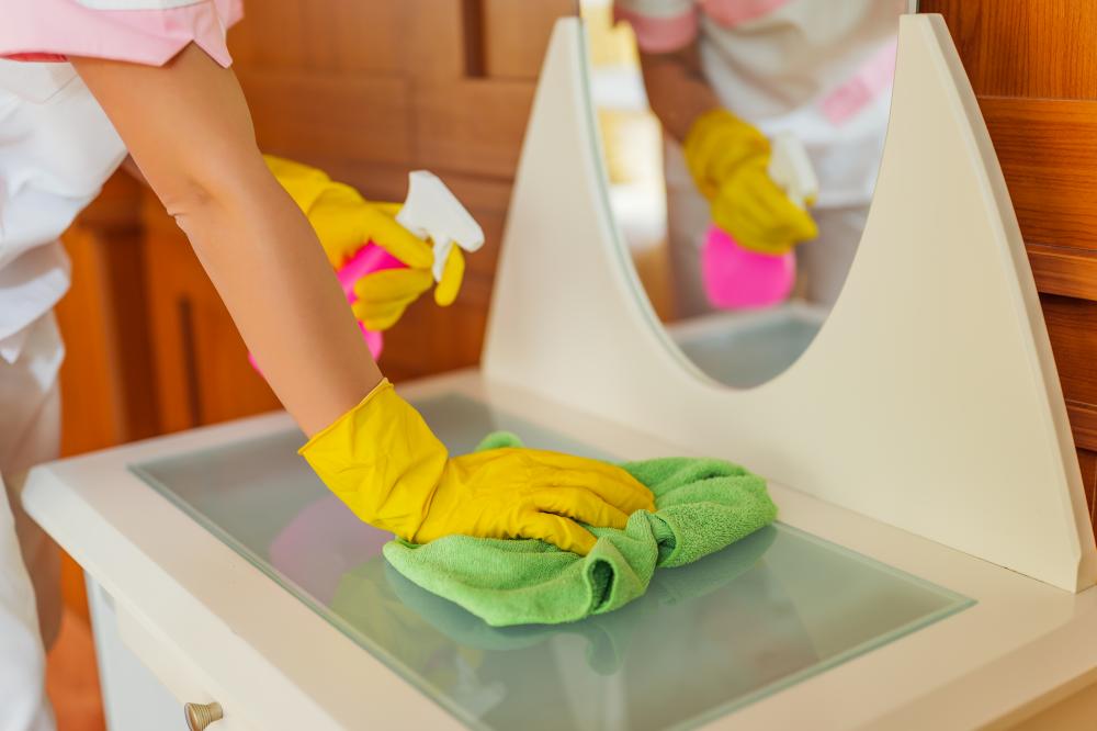 Detailed furniture cleaning by professional maid highlighting industry advancements