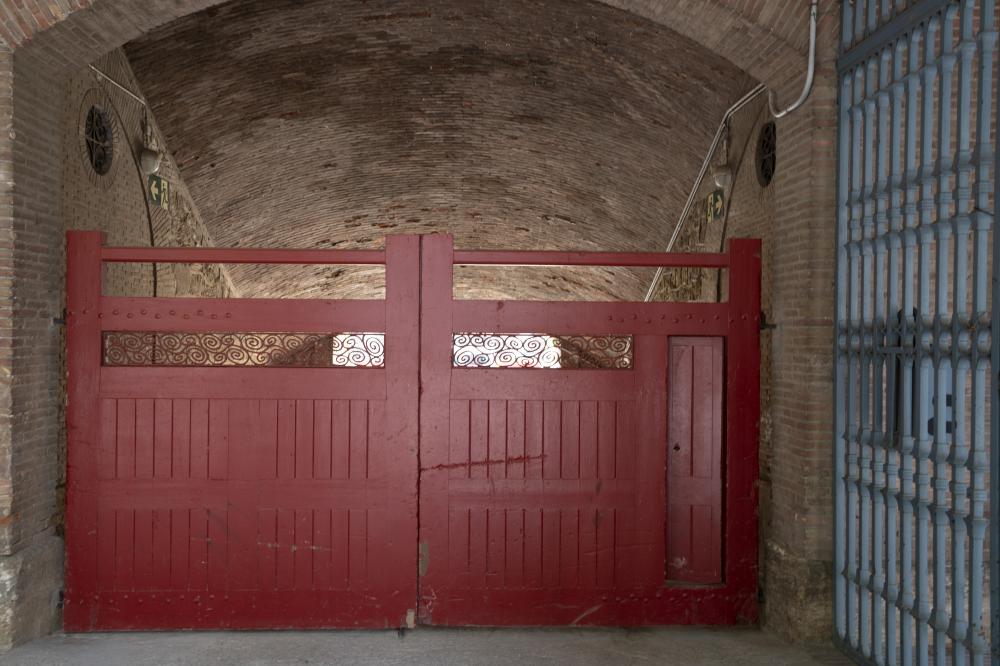 Technician expertly installing garage door components, ensuring smooth operation and safety