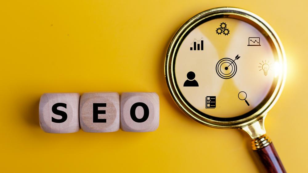 SEO optimization concept with wooden cubes on a desktop