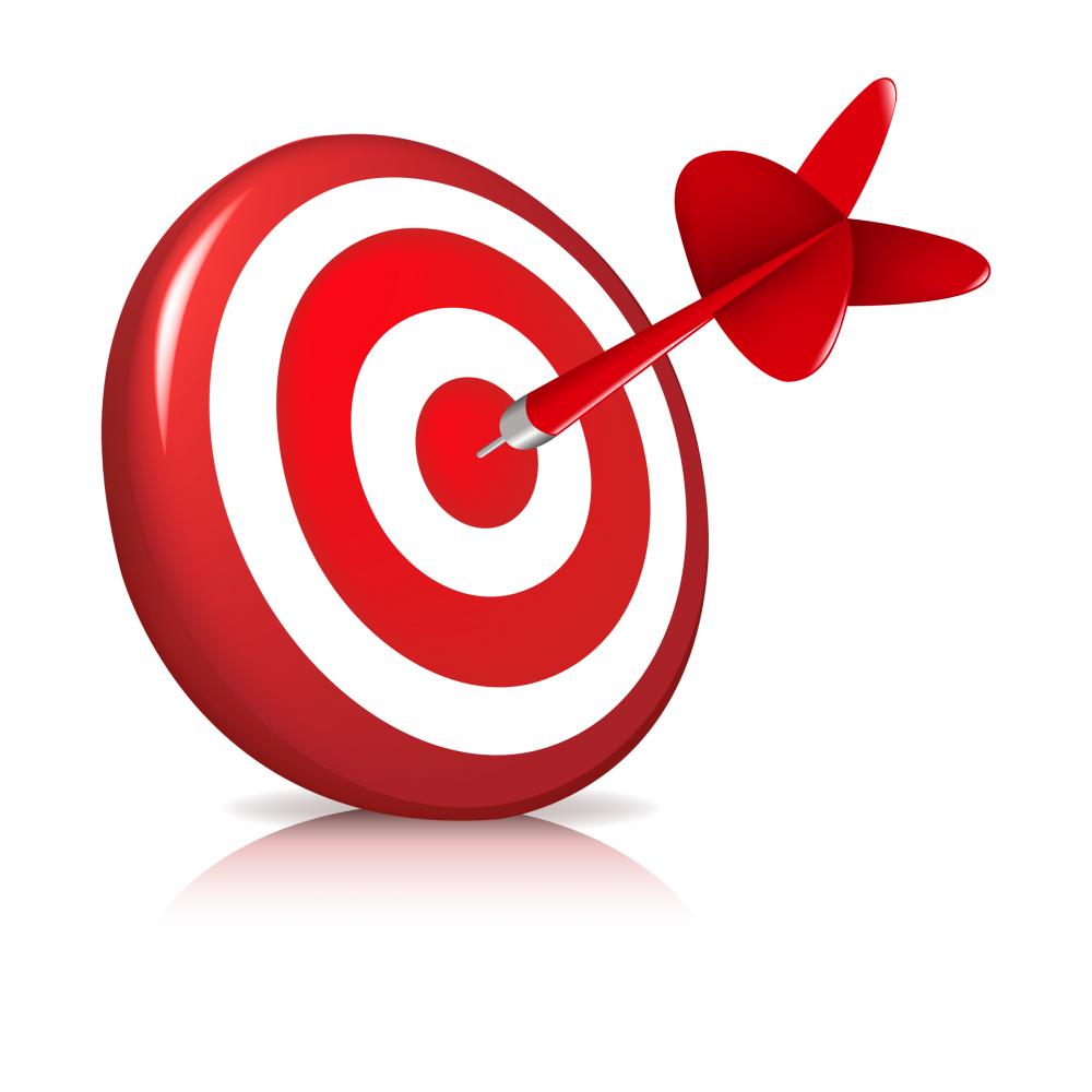 Target bullseye with a red dart, symbolizing precision and focus in digital marketing strategies for enhanced online presence.
