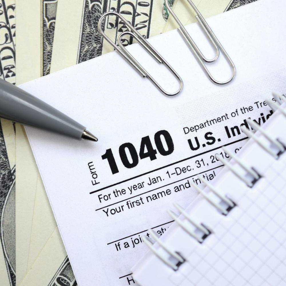 Expert Tax Consultant Reviewing Documents for Palm Beach Tax Appeals Expert Tax Consultant Reviewing Documents for Palm Beach Tax Appeals