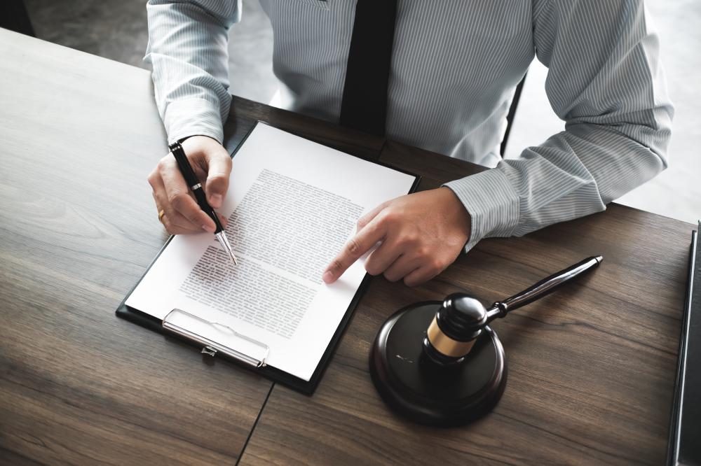 Contract lawyer negotiating terms with clients
