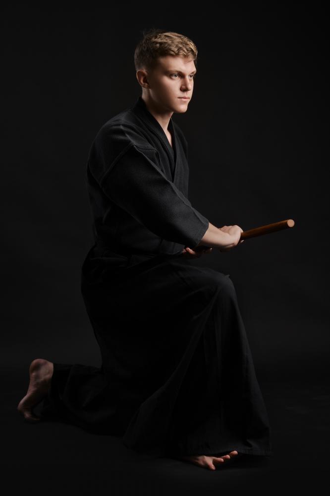 Kendo master in traditional kimono showcasing martial arts skills