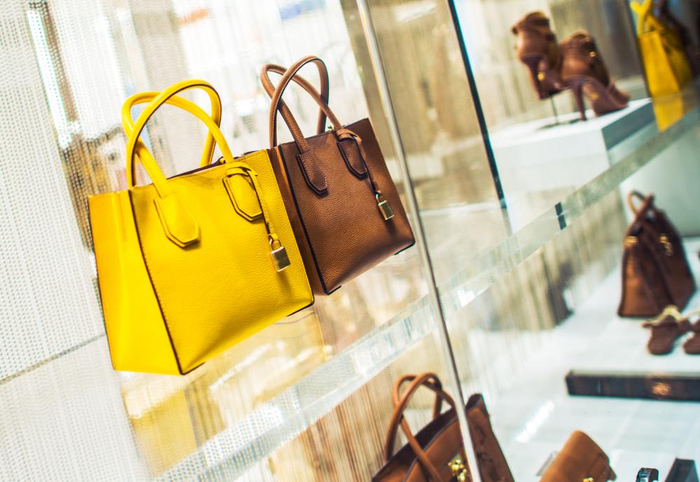 Elegant display of Louis Vuitton handbags in boutique setting