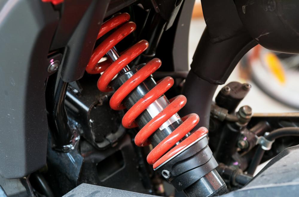 Motorcycle shock absorber symbolizing premium off-road performance