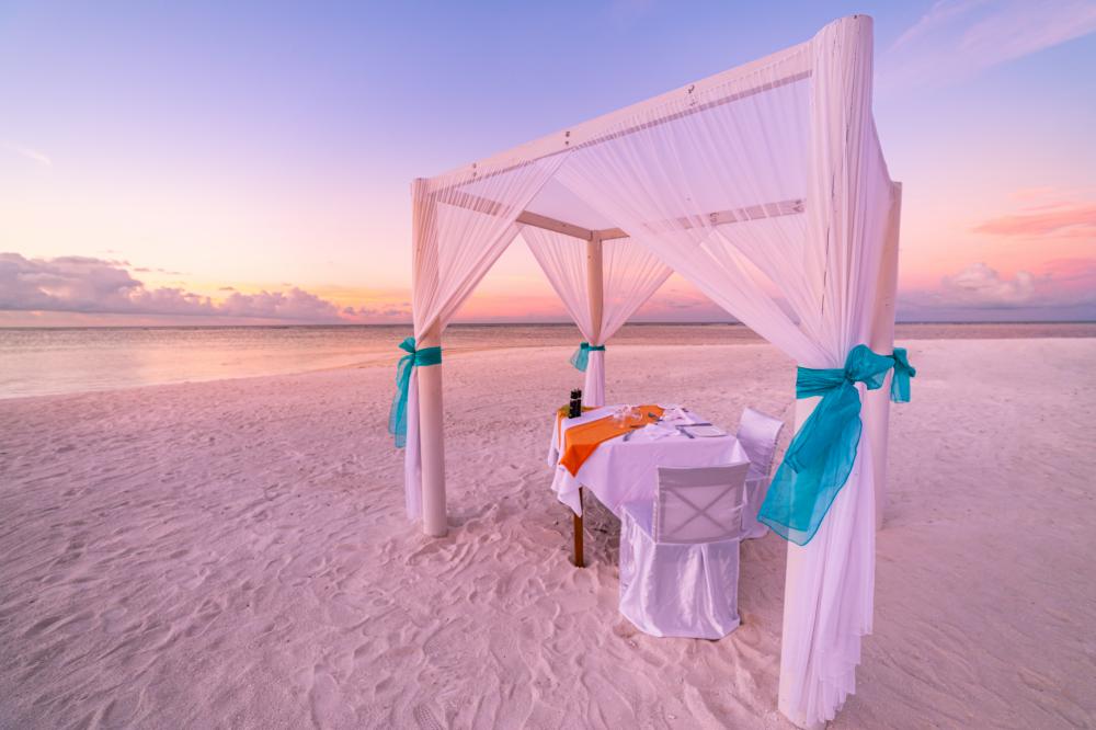 Romantic beach dinner at sunset in the Florida Keys
